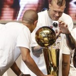 Miami Heat forward Chris Andersen, right, takes a photo of forward Shane Battier, Monday, June 24, 2013, after a celebration for season ticket holders at the American Airlines Arena in Miami. The Heat defeated the San Antonio Spurs 95-88 in Game 7 to win their second straight NBA basketball championship. (AP Photo/Wilfredo Lee)