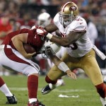 Arizona Cardinals quarterback John Skelton (19) avoids a sack by San Francisco 49ers outside linebacker Ahmad Brooks (55) during the second half of an NFL football game, Monday, Oct. 29, 2012, in Glendale, Ariz. The 49ers won 24-3. (AP Photo/Ross D. Franklin)