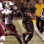  Missouri wide receiver Bud Sasser, right, pushes past South Carolina's Skai Moore after a reception during the first quarter of an NCAA college football game Saturday, Oct. 26, 2013, in Columbia, Mo. (AP Photo/L.G. Patterson)