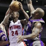 Phoenix Suns forward P.J. Tucker, right, defends as Detroit Pistons guard Kim English (24) drives to the basket in the second half of an NBA basketball game, Wednesday, Nov. 28, 2012, in Auburn Hills, Mich. The Pistons won 117-77. (AP Photo/Duane Burleson)