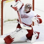 Detroit Red Wings goalie Jimmy Howard reaches for the puck as it gets past him for a goal by Nashville Predators' Matt Halischuk in the second period of Game 1 of a first-round NHL hockey playoff series on Wednesday, April 11, 2012, in Nashville, Tenn. (AP Photo/Mark Humphrey)