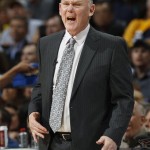 Denver Nuggets head coach George Karl directs his team against the Golden State Warriors during the first quarter of Game 5 of their first-round NBA basketball playoff series, Tuesday, April 30, 2013, in Denver. (AP Photo/David Zalubowski)