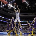 Duke's Mason Plumlee (5) goes up for a shot against Albany's John Puk (44) during the first half of a second-round game of the NCAA college basketball tournament, Friday, March 22, 2013, in Philadelphia. (AP Photo/Matt Slocum)