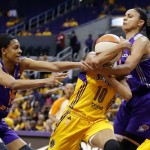 Phoenix Mercury's Briana Gilbreath, left, and Candice Dupree, right, defend against Los Angeles Sparks' Lindsey Harding, center, during the second half in Game 1 of their WNBA basketball Western Conference semifinal series on Thursday, Sept. 19, 2013, in Los Angeles. The Mercury won 86-75. (AP Photo/Danny Moloshok)