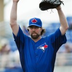 Toronto Blue Jays starting pitcher R.A. Dickey works against the Boston Red Sox during first inning of a spring training baseball game in Dunedin, Fla., on Monday, Feb. 25, 2013. (AP Photo/The Canadian Press, Nathan Denette)