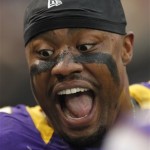Minnesota Vikings defensive tackle Kevin Williams (93) celebrates on the sideline after sacking Arizona Cardinals quarterback John Skelton (19) in the second half of an NFL football game in Minneapolis, Sunday, Oct. 21, 2012. (AP Photo/Andy King)