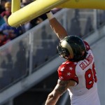 South receiver Crockett Gillmore, of Colorado St., spikes the ball over the crossbar after scoring a touchdown during the first half of the Senior Bowl NCAA college football game against the North on Saturday, Jan. 25, 2014, in Mobile, Ala. (AP Photo/Butch Dill)