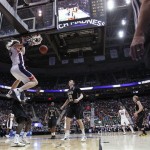 Gonzaga's Kelly Olynyk dunks against Wichita State in the first half during a third-round game in the NCAA men's college basketball tournament in Salt Lake City on Saturday, March 23, 2013. (AP Photo/George Frey)
