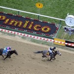 Oxbow (6), ridden by jockey Gary Stevens, wins the 138th Preakness Stakes horse race ahead of Itsmyluckyday (9), ridden by John Velazquez, and Mylute, ridden by Rosie Napravnik at Pimlico Race Course, Saturday, May 18, 2013, in Baltimore. (AP Photo/Nick Wass)
