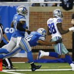 Dallas Cowboys wide receiver Dez Bryant (88) scores on a 50-yard touchdown reception as Detroit Lions outside linebacker DeAndre Levy (54) defends in the fourth quarter of an NFL football game in Detroit, Sunday, Oct. 27, 2013. (AP Photo/Rick Osentoski)