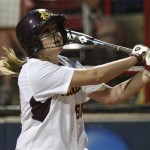 Arizona State's Annie Lockwood watches her home run against Florida in the fifth inning of a Women's College World Series championship series game in Oklahoma City, Monday, June 6, 2011. Arizona State won 14-4. (AP Photo/Sue Ogrocki)