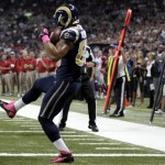 St. Louis Rams tight end Lance Kendricks catches a 7-yard pass for a touchdown during the first quarter of an NFL football game against the Arizona Cardinals, Thursday, Oct. 4, 2012, in St. Louis. (AP Photo/Tom Gannam)
