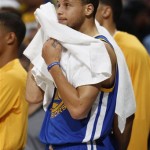 Golden State Warriors guard Stephen Curry reacts as time runs out on their 107-100 loss to the Denver Nuggets in Game 5 of their first-round NBA basketball playoff series, Tuesday, April 30, 2013, in Denver. (AP Photo/David Zalubowski)