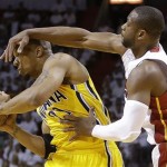 Indiana Pacers power forward David West (21) and Miami Heat shooting guard Dwyane Wade (3) vie for the ball during the first half of Game 7 in their NBA basketball Eastern Conference finals playoff series, Monday, June 3, 2013 in Miami. (AP Photo/Lynne Sladky)