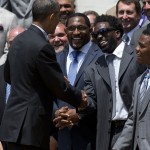 President Barack Obama shakes hands with former Baltimore Raven safety Ed Reed, now with the Houston Texans, right, as retired linebacker Ray Lewis, center, and others, watch during a ceremony on the South Lawn of the White House in Washington, Wednesday, June 5, 2013, where the president honored the NFL champion Baltimore Ravens. The Ravens defeated the San Francisco 49ers in Super Bowl XLVII.. (AP Photo/Evan Vucci)