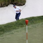 Matt Kuchar hits out of a bunker on the 17th hole during the fourth round of the U.S. Open golf tournament at Merion Golf Club, Sunday, June 16, 2013, in Ardmore, Pa. (AP Photo/Gene J. Puskar)
