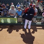  Cleveland Indians' Ezequiel Carrera signs for fans before an exhibition spring training baseball game against the San Francisco Giants Thursday, March 7, 2013, in Goodyear, Ariz. (AP Photo/Mark Duncan)
