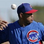 Chicago Cubs' Carlos Marmol loses the grip on a ball during a baseball spring training workout Thursday, Feb. 14, 2013, in Mesa, Ariz. (AP Photo/Morry Gash)