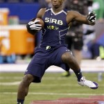 Louisiana State running back Alfred Blue runs a drill at the NFL football scouting combine in Indianapolis, Sunday, Feb. 23, 2014. (AP Photo/Nam Y. Huh)

