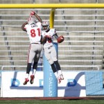 UNLV wide receiver Marcus Sullivan (18) celebrates his touchdown reception against North Texas with wide receiver Devante Davis (81) during the first half of the Heart of Dallas NCAA college football game, Wednesday, Jan. 1, 2014, in Dallas. (AP Photo/Mike Stone)