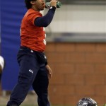 Seattle Seahawks quarterback Russell Wilson drinks during NFL football practice Thursday, Jan. 30, 2014, in East Rutherford, N.J. The Seahawks and the Denver Broncos are scheduled to play in the Super Bowl XLVIII football game Sunday, Feb. 2, 2014. (AP Photo)