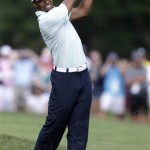 Tiger Woods hits down the sixth hole during the third round of the U.S. Open golf tournament at Merion Golf Club, Saturday, June 15, 2013, in Ardmore, Pa. (AP Photo/Darron Cummings)
