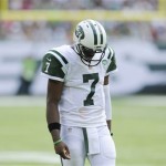 New York Jets quarterback Geno Smith reacts in the first half of an NFL football game against the Tampa Bay Buccaneers, Sunday, Sept. 8, 2013, in East Rutherford, N.J. (AP Photo/Bill Kostroun)
