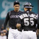 Colorado Rockies starting pitcher Jhoulys Chacin, left, confers with 
catcher Ramon Hernandez (55) after giving up an RBI-single to 
Arizona Diamondbacks' Chris Young in the first inning of a baseball 
game in Denver, Saturday, April 14, 2012. (AP Photo/David 
Zalubowski)
