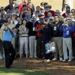 Phil Mickelson hits out of the rough on the ninth hole during a practice round for the Masters golf tournament Wednesday, April 6, 2011, in Augusta, Ga. (AP Photo/Charlie Riedel)
 