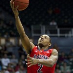 Arizona guard Mark Lyons (2) shoots a layup against Miami in the first half of an NCAA college basketball game in the Diamond Head Classic Sunday, Dec. 23, 2012, in Honolulu. (AP Photo/Eugene Tanner)