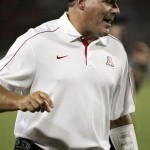 Arizona head coach Rich Rodriguez reacts to a touchdown against Oklahoma State during the first half of an NCAA college football game at Arizona Stadium in Tucson, Ariz., Saturday, Sept. 8, 2012. (AP Photo/John Miller)
