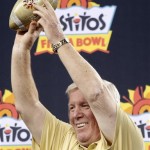 Central Florida head coach George O'Leary holds the Fiesta Bowl champions trophy after the Fiesta Bowl NCAA college football game against Baylor, Wednesday, Jan. 1, 2014, in Glendale, Ariz. Central Florida won 52-42. (AP Photo/Rick Scuteri)