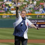 Mesa, Ariz., Mayor Scott Smith throws out the first pitch prior to the spring training baseball game between the Arizona Diamondbacks and the Chicago Cubs on Thursday in Mesa. It was the Cubs' first Cactus League game in their new spring training facility. (AP Photo/Matt York)