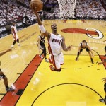Miami Heat center Chris Bosh (1) heads to the basket against the San Antonio Spurs during the second half of Game 1 of basketball's NBA Finals, Thursday, June 6, 2013 in Miami. (AP Photo/Mike Ehrmann, Pool)