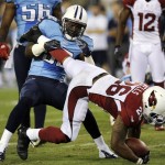 Arizona Cardinals running back Beanie Wells (26) is brought down by Tennessee Titans linebacker Will Witherspoon (92) in the first quarter of an NFL football preseason game on Thursday, Aug. 23, 2012, in Nashville, Tenn. (AP Photo/Joe Howell)