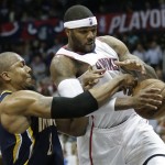 Indiana Pacers power forward David West (21) vies for a loose ball against Atlanta Hawks small forward Josh Smith (5) during the second half in Game 4 of their first-round NBA basketball playoff series,basketball game Monday, April 29, 2013 in Atlanta. (AP Photo/John Bazemore)