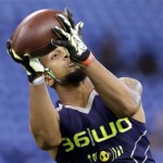 Mississippi wide receiver Donte Moncrief makes a catch during a drill at the NFL football scouting combine in Indianapolis, Sunday, Feb. 23, 2014. (AP Photo/Michael Conroy)