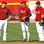 Arizona Diamondbacks head coach Kirk Gibson, 
center, talks with first baseman Paul 
Goldschmidt, right, and Lyle Overbay during the 
Diamondbacks' team workouts Monday, Oct. 3, 
2011 in Phoenix. The Diamondbacks will face the 
Milwaukee Brewers in Game 3 of National League 
division series Tuesday. (AP Photo/Matt York)