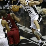 San Antonio Spurs' Manu Ginobili (20), of Argentina, dunks during the second half at Game 3 of the NBA Finals basketball series against the Miami Heat, Tuesday, June 11, 2013, in San Antonio. (AP Photo/David J. Phillip)
