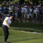 Phil Mickelson hits on the sixth hole during the third round of the U.S. Open golf tournament at Merion Golf Club, Saturday, June 15, 2013, in Ardmore, Pa. (AP Photo/Charlie Riedel)
