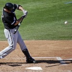  Chicago White Sox's Paul Konerko hits a home run during the fourth inning of an exhibition spring training baseball game against the Chicago Cubs, Thursday, March 7, 2013, in Mesa, Ariz. (AP Photo/Morry Gash)