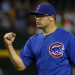 Chicago Cubs' Kevin Gregg pumps his fist after the final out against the Arizona Diamondbacks in the ninth inning of a baseball game on Monday, July 22, 2013, in Phoenix. (AP Photo/Ross D. Franklin)