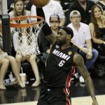 Miami Heat's LeBron James (6) dunks against the San Antonio Spurs during the first half at Game 5 of the NBA Finals basketball series, Sunday, June 16, 2013, in San Antonio. (AP Photo/David J. Phillip)