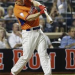 National League captain David Wright, of the New York Mets, hits his second home run during the MLB All-Star baseball Home Run Derby, on Monday, July 15, 2013 in New York. (AP Photo/Matt Slocum)