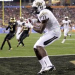 Central Florida wide receiver Breshad Perriman (11) scores a touchdown against Baylor during the second half of the Fiesta Bowl NCAA college football game, Wednesday, Jan. 1, 2014, in Glendale, Ariz. (AP Photo/Rick Scuteri)
