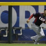 United States right fielder Giancarlo Stanton catches a fly ball hit by Italy's Chris Denorfia during the first inning of a World Baseball Classic game Saturday, March 9, 2013, in Phoenix. (AP Photo/Charlie Riedel)
