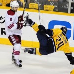 Phoenix Coyotes center Gilbert Brule (8) checks Nashville Predators right wing Matt Halischuk (24) in the first period of Game 4 in an NHL hockey Stanley Cup Western Conference semifinal playoff series, Friday, May 4, 2012, in Nashville, Tenn. (AP Photo/Mike Strasinger)