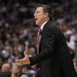 Louisville coach Rick Pitino reacts during the first half of an NCAA men's college basketball tournament West Regional semifinal against Michigan State on Thrusday, March 22, 2012, in Phoenix. (AP Photo/Chris Carlson)