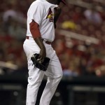 St. Louis Cardinals relief pitcher Maikel Cleto walks back to the mound after giving up a two-run single to Arizona Diamondbacks' Gerardo Parra during the eighth inning of a baseball game on Wednesday, June 5, 2013, in St. Louis. (AP Photo/Jeff Roberson)