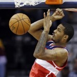 Washington Wizards' Trevor Ariza dunks against the Cleveland Cavaliers in the second quarter of an NBA basketball game, Tuesday, Oct. 30, 2012, in Cleveland. (AP Photo/Mark Duncan)